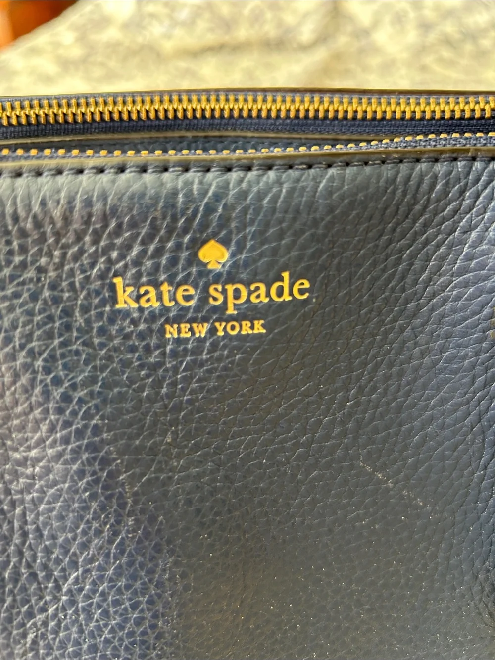 kate spade navy pebbled leather satchel with gold-tone accents